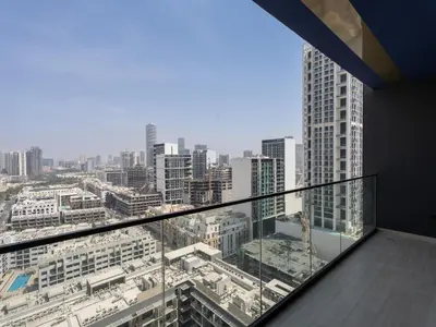 a view of a city from a building balcony at Chic and Stylish 1 BDR in Binghatti corner - JVC in Dubai