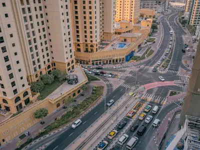an aerial view of a busy city street with cars at Superb 2BR Prime Locale between Dubai Marina JBR in Dubai