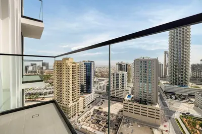 a view of a city from a building at Private Pool! Exceptional 2 Bedroom! Brand New Building with Pool and Gym! in Dubai