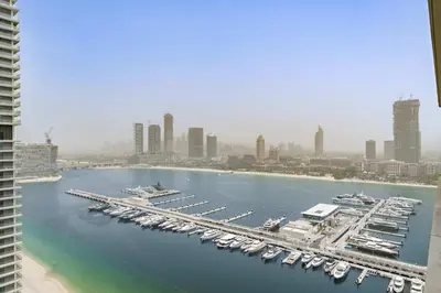 a view of a marina with boats in the water at Silkhaus Seaside Bliss 1BDR in Marina Vista in Dubai