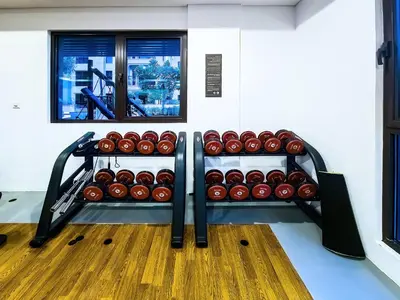 a room with a shelf of donuts in a gym at Chic 2BD in Lamtara for 4, Madinat Jumeirah Living in Dubai
