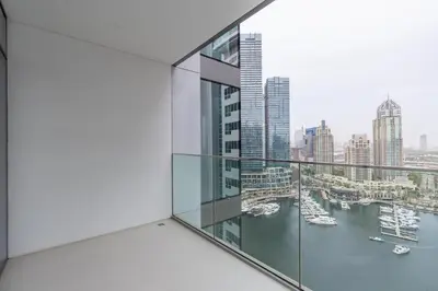 an empty room with a view of a city at Bespoke Holiday Homes - Luxury 2BR with Stunning Marina Views in LIV Marina in Dubai