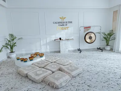a rendering of a room with a bed and a table at 1BR Lagoon View Luxury Spa Retreat near Miracle Garden in Dubai