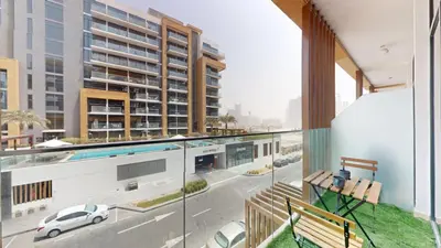 an apartment balcony with a view of a street at Azizi Riviera - Chic Studio with Balcony in Meydan in Dubai