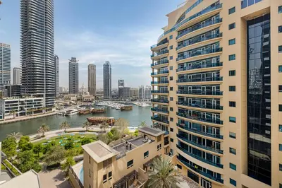 a view of a river in a city with tall buildings at Sparkle Tower by Swarovski, Full Marina View, 2min JBR & Metro, Sleeps 4 in Dubai