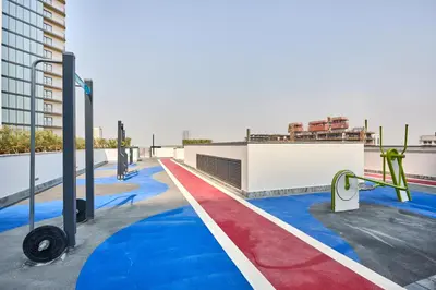 a building with a red white and blue painted floor at STAY BY LATINEM Luxury 1BR Holiday Home CA 0906 Near Burj Khalifa in Dubai