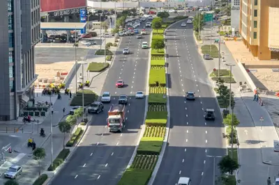 an aerial view of a busy city street with cars at Unwind in a Stylish Studio with Pool, Sauna, and Stunning City Views in Dubai