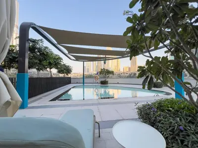 a swimming pool on the roof of a building at TRPS - Grande, Downtown - Full Burj Khalifa View, Luxury Furnished - Close to Dubai Mall in Dubai