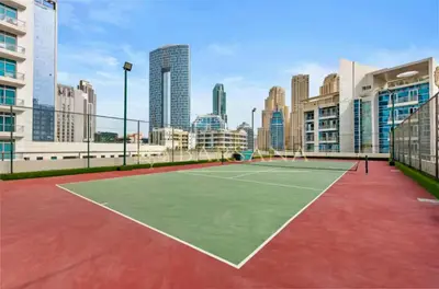 a tennis court in the middle of a city at Barsana - Lavish 3BR Retreat - Marina & Sea Views in Dubai