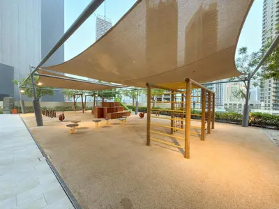 a pavilion with tables and benches in a city at 4BR Burj & Fountain View Luxe in Dubai