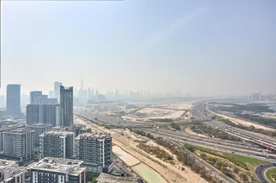 an aerial view of a city with tall buildings at STAY BY LATINEM Luxury 1BR Holiday Home CB 3607 Near Burj Khalifa in Dubai