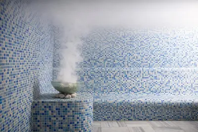 a bathroom with a fountain with steam coming out of it at Resort lifestyle, Fantastic Views, Bright & Brand new in Dubai