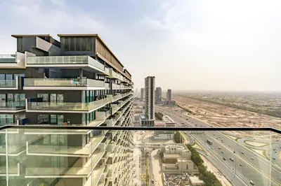 a rendering of a tall building with a highway at PVH - Binghatti Heights - Urban Luxury 3BR in Dubai