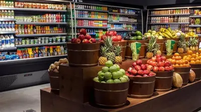 a produce section of a grocery store with fruits and vegetables at High Floor Burj Khalifa View Luxurious 1BR in Dubai