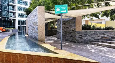 a street sign in front of a building at Blakely Tower, Park Island, Dubai Marina - Mint Stay in Dubai