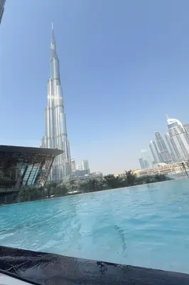 a view of a city with a tall building at Burj Khalifa View Apartment in Dubai