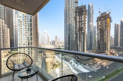 a balcony with a view of a city at The Lofts West, Downtown Dubai - Mint Stay in Dubai