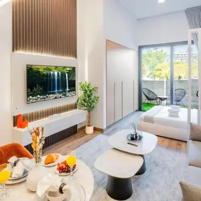 Luxury Apartment In JVC With Padel Gym Pool Cinema BBQ