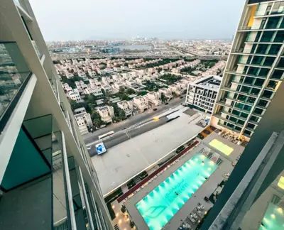 a view of a swimming pool from a building at Modern Place - Binghatti Azure 1244 in Dubai