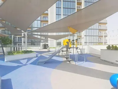 a playground in the middle of a building at The Crest A - Premium Two Bedroom High-Rise Escape in Dubai