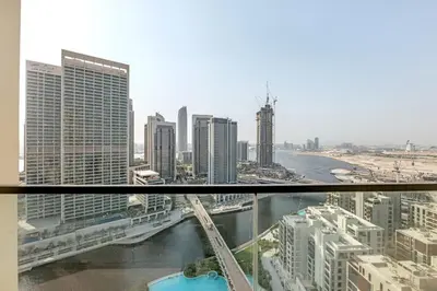 a view of a city from a skyscraper at Guest Favorite - Premium & Modern 2BR Stay at Dubai Creek Harbour in Dubai