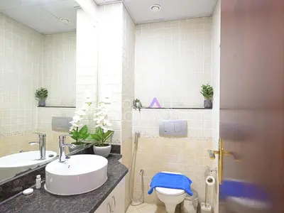 a bathroom with a sink and a toilet in it at Spacious 3BR in Zen Tower Dubai Marina in Dubai