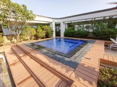 an image of a swimming pool on a deck at Sky Gardens - High Rise Studio with Cityscape View in Dubai