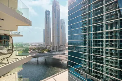 a view of a river in a city with tall buildings at Moon Stays - 5 PAX Missoni Flat - Canal View in Dubai
