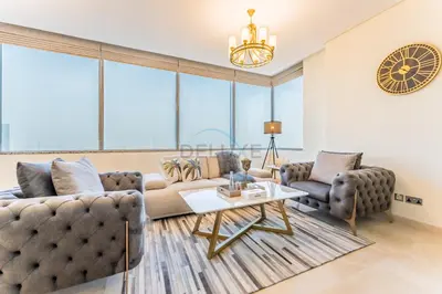 a living room with two couches and a table at Close to Museum of the Future with Zaabeel Palace Views, Minutes from Dubai Mall And Burj Khalifa - Sky Gardens, DIFC by Deluxe Holiday Homes in Dubai
