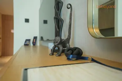 a statue of a monkey sitting on a table at The Autograph-Art Meets Comfort in Dubai