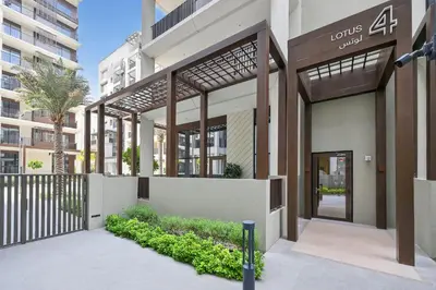 a rendering of the front of a building at Modern 3BD with Maid's Room near Lagoon at Lotus 4 in Dubai