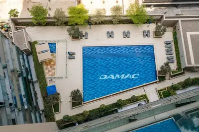 an aerial view of a daniota sign on a building at DAYF-MER Stylish 1Bed in central location Business Bay in Dubai