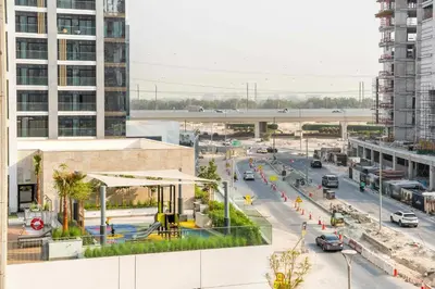 an overhead view of a city street with traffic at AirDXB - Meydan Apartment sleeps 4 in Great Location in Dubai