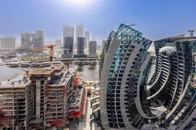 a view of a city with tall buildings and a river at High floor, Canal View, Parking, Crib, Dubai Mall & Burj Khalifa in Dubai