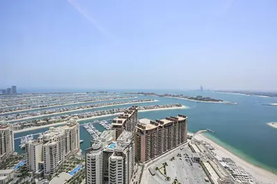an aerial view of a city with a marina at NEW Luxury studio - Amazing Palm Views in Dubai