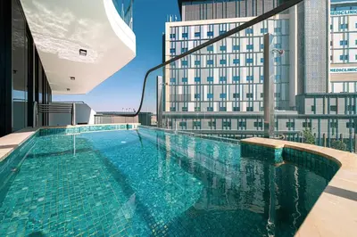a swimming pool on the roof of a building at Park Views by Samana with Private Pool in Dubai