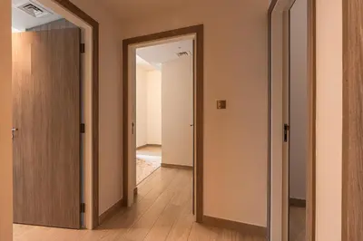 an open door to a hallway with a doorframe at Spacious 2 Bedrooms with maid room I JLT in Dubai