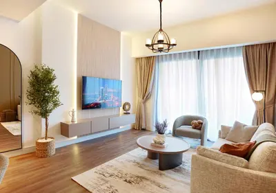 a living room with a couch and a table at Chic 2BR in Downtown, 5 Min Walk to Burj Khalifa in Dubai