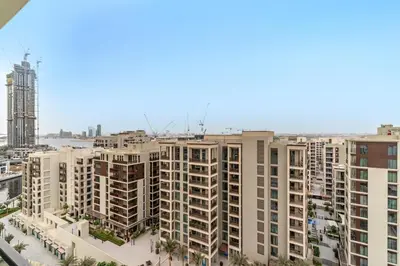 an aerial view of a city with tall buildings at FIRST CLAS 1BR Creek Beach , Lagoon Access in Dubai
