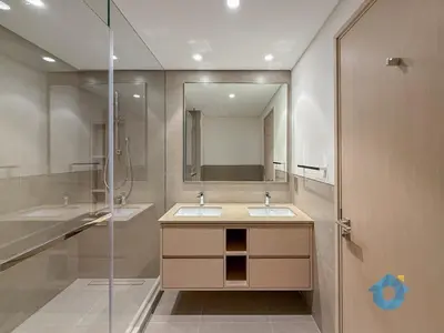 a bathroom with two sinks and a shower at Next to Burj Khalifa & Dubai Mall Luxury 2BR Grande Signature - Like Home in Dubai