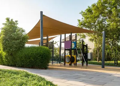 a playground with a canopy in a park at Classy 2BR Dubai Getaway Near Downtown in Dubai