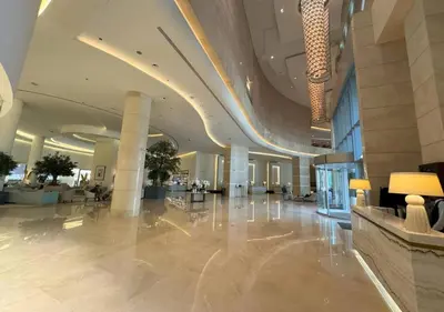 a lobby of a building with a large at JW Marriott Marina Residences in Dubai