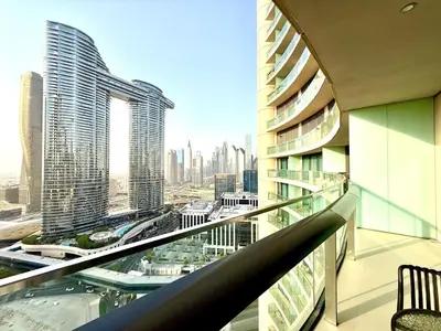 a view of a city from the balcony of a building at Charming 1 BR with Balcony Retreat in Dubai