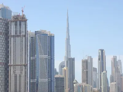 a group of tall buildings in a city at Sobha Creek Vistas Reserve, Sobha Hartland, Dubai in Dubai