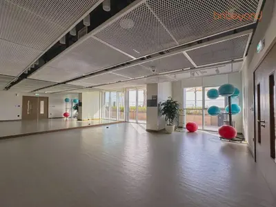 a large room with a dance floor with red and blue balls at Exclusive Home with Private Beach in Dubai