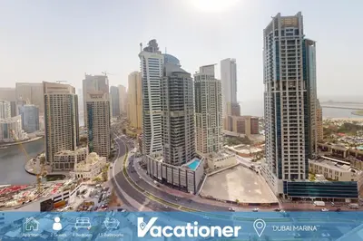 an aerial view of a city with tall buildings at Vacationer l Urban Luxe 1 Bedroom l with Marina Views in Dubai