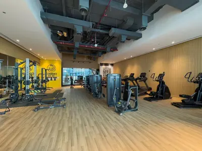 a gym with treadmills and exercise equipment in a room at Palm Jumeirah, panoramic free pool,beach in Dubai