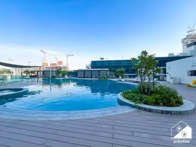 a swimming pool on the roof of a building at Luxury 1-Bed in Meydan with Balcony & City Views in Dubai