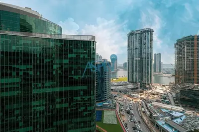 a view of a city with tall buildings and traffic at Aspin Modern Studio Apartment in AHAD Residency in Dubai