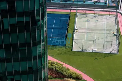 an aerial view of a building with a soccer goal at Aspin Modern Studio Apartment in AHAD Residency in Dubai